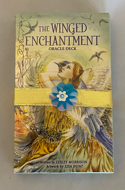 Winged Enchantment Oracle Deck packaging with fairy illustration and floral design.