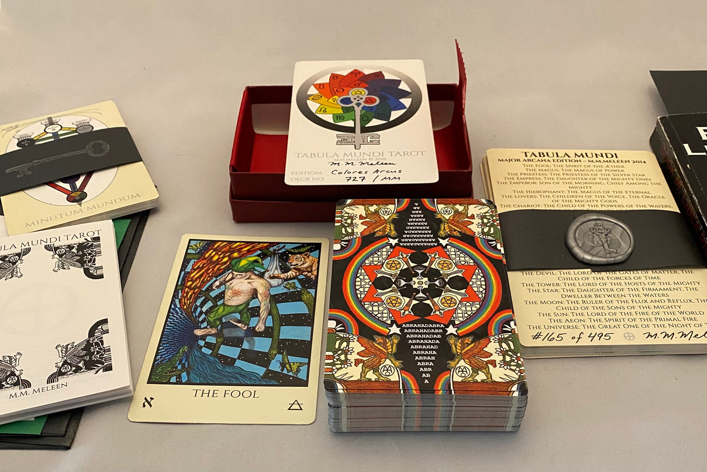 Collection of tarot cards and packaging on a table