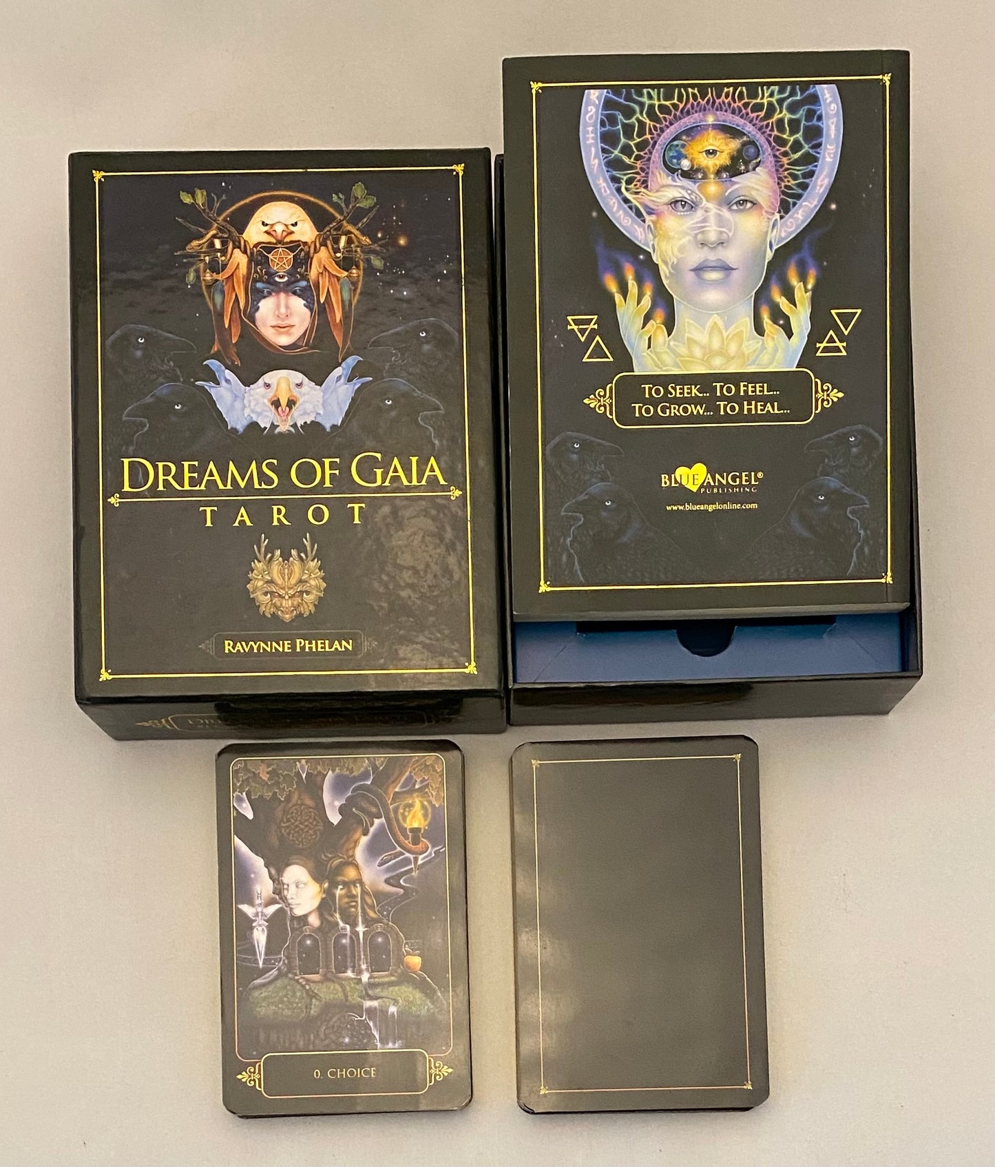 Tarot card set with 'Dreams of Gaia' packaging on a light gray background