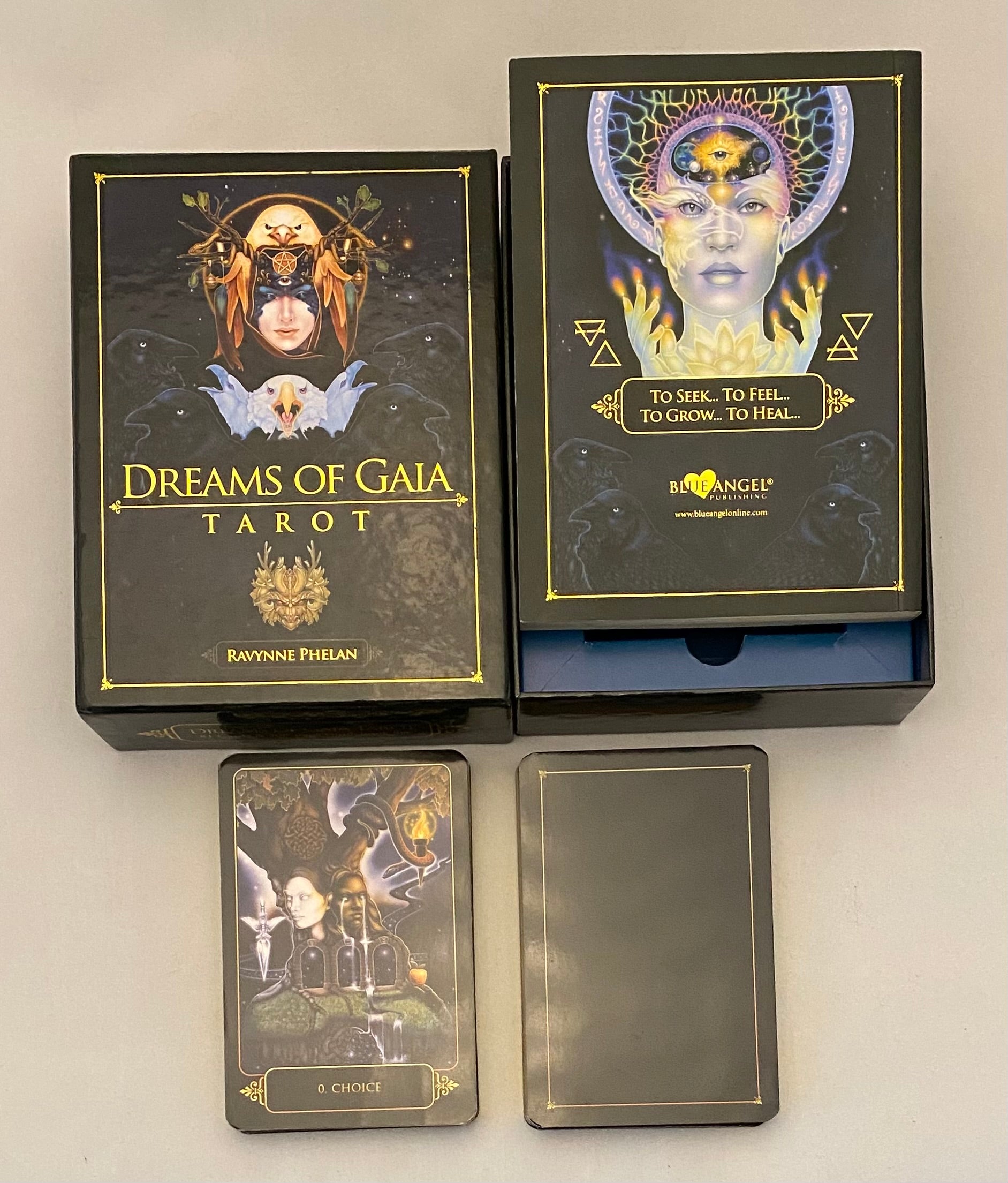 Tarot card set with 'Dreams of Gaia' packaging on a light gray background