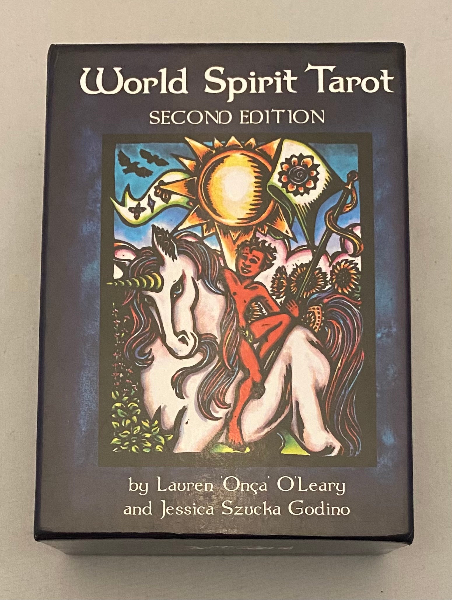 World Spirit Tarot Second Edition book cover with artwork of a person on a horse and celestial elements.