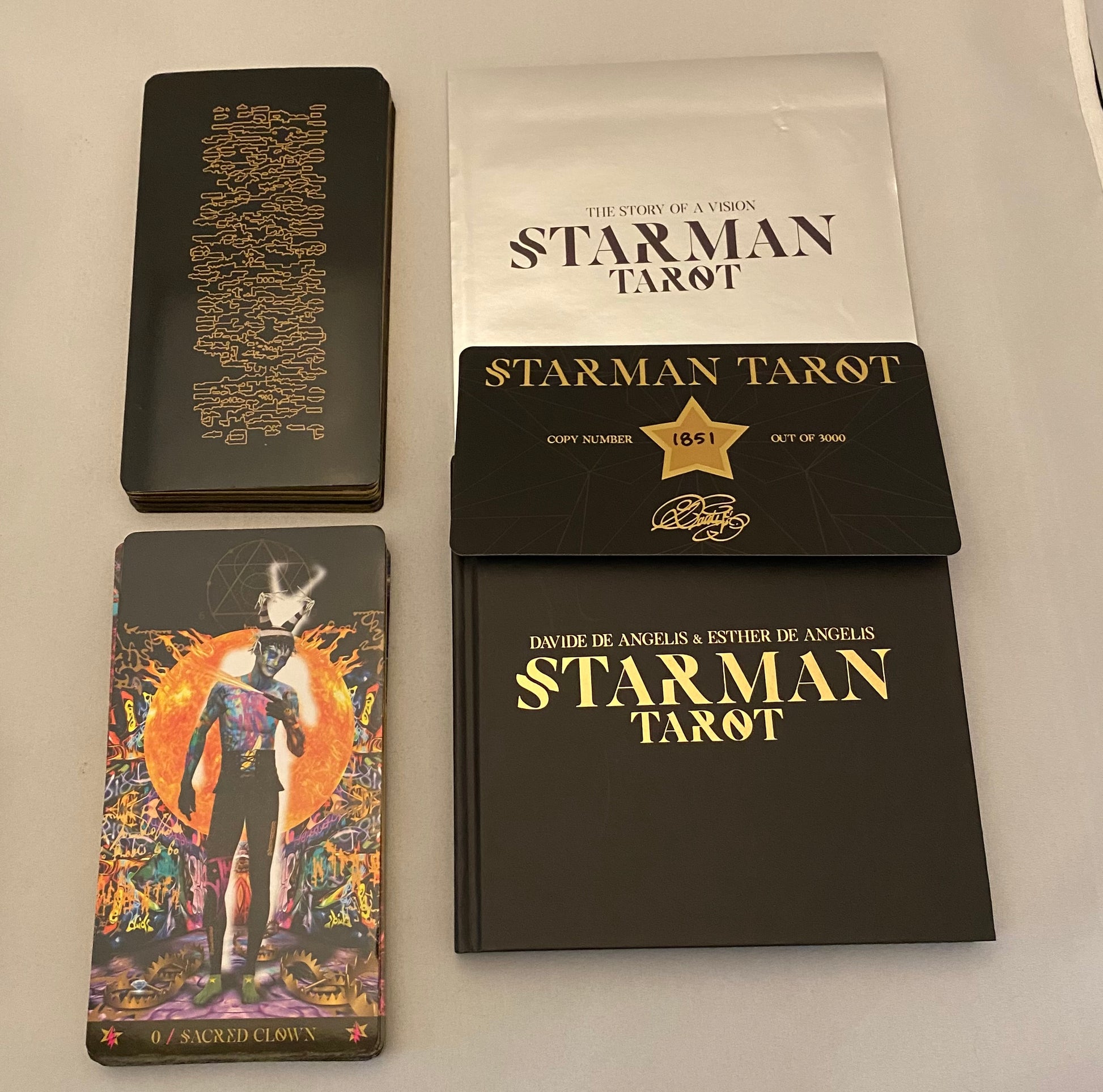 Starman Tarot cards with packaging on a light gray background