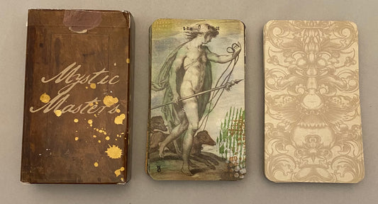 Mystic Masters box with illustrations of the fool on a gray background