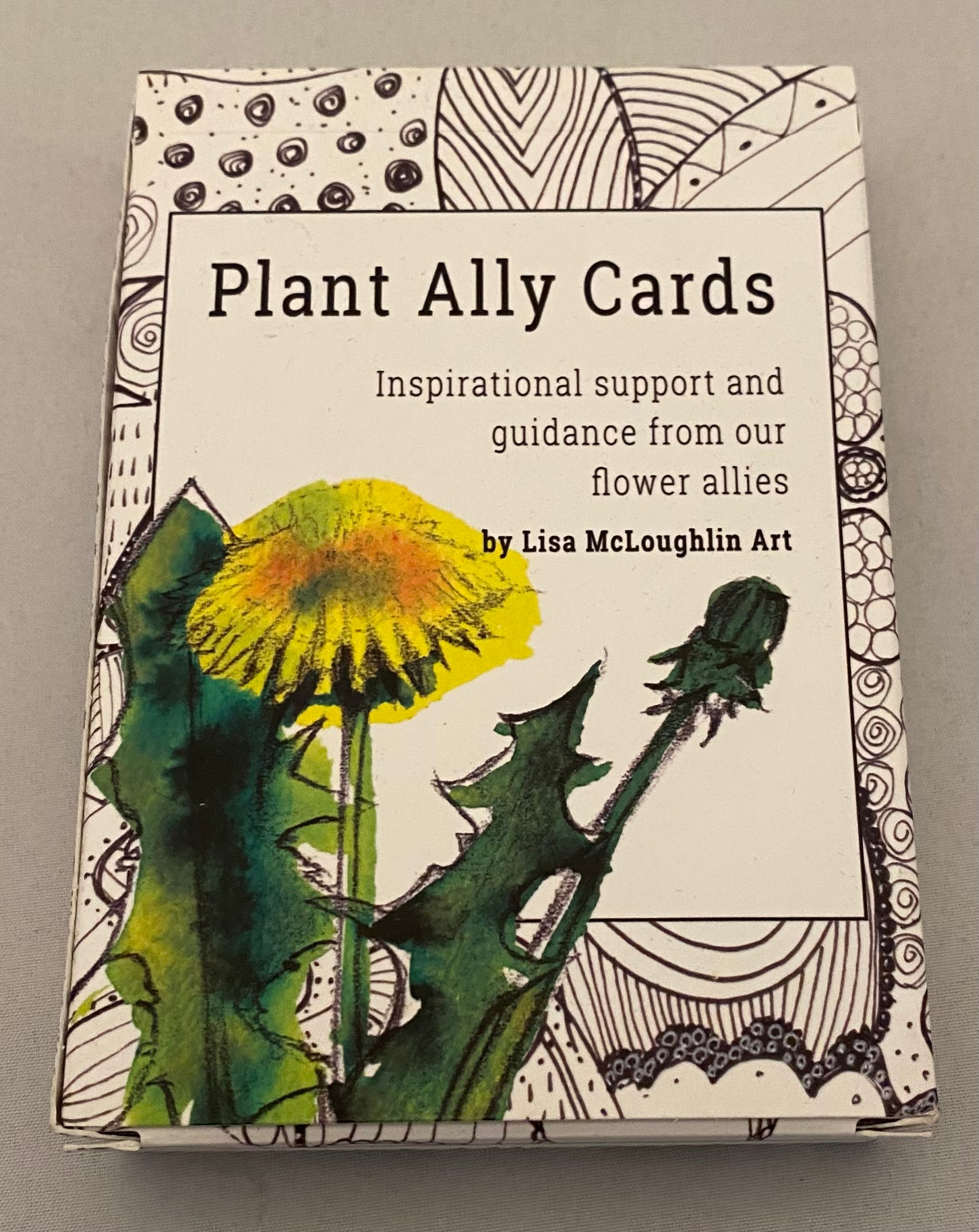 Packaging of 'Plant Ally Cards' with illustrations of plants on a gray background