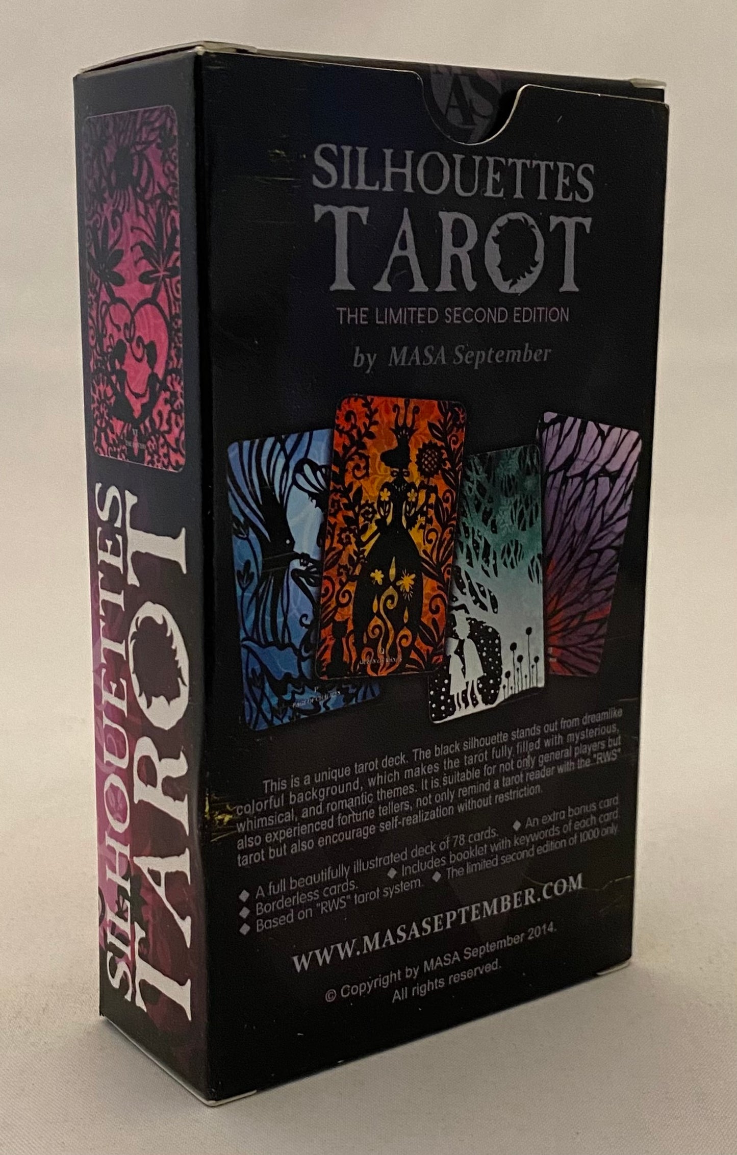 Box of Silhouettes Tarot with colorful tarot card images on a black background