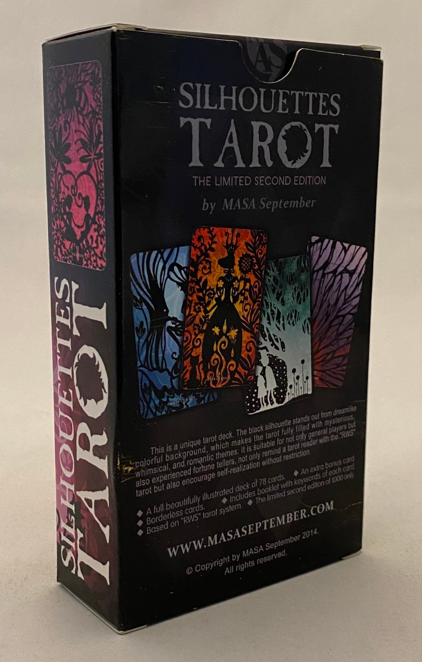 Box of Silhouettes Tarot with colorful tarot card images on a black background