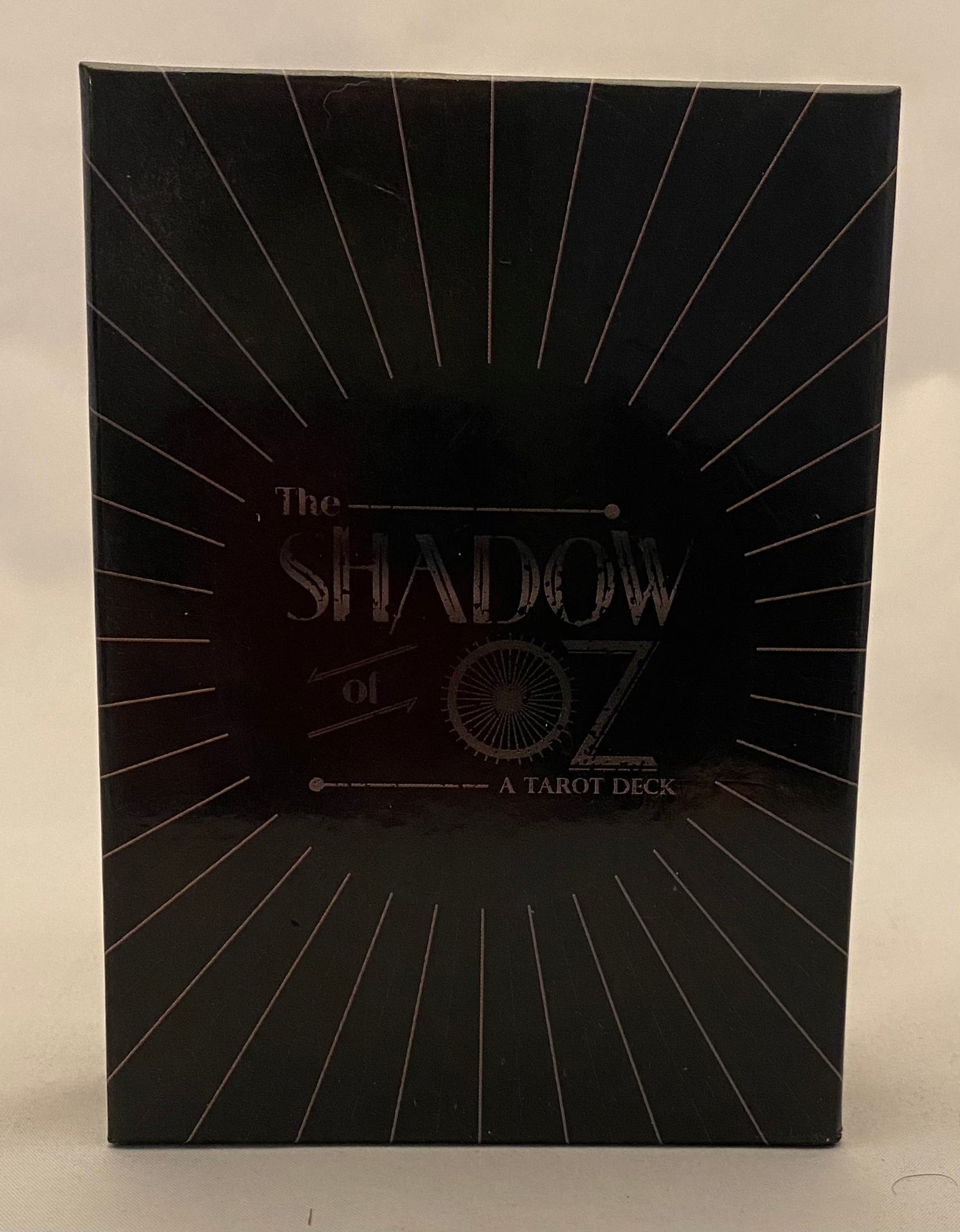 Black tarot deck box with 'The Shadow of Oz' text on a white background