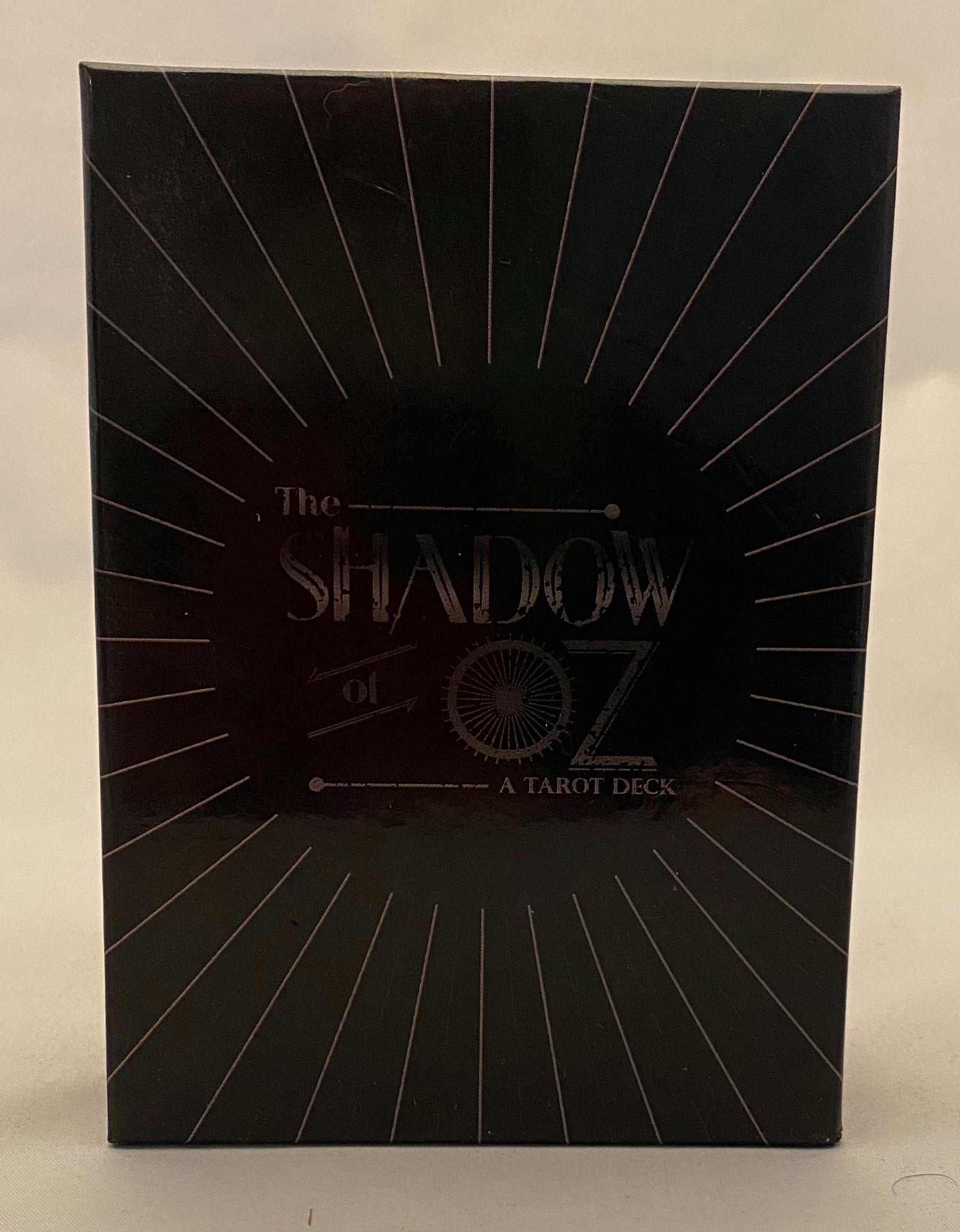 Black tarot deck box with 'The Shadow of Oz' text on a white background