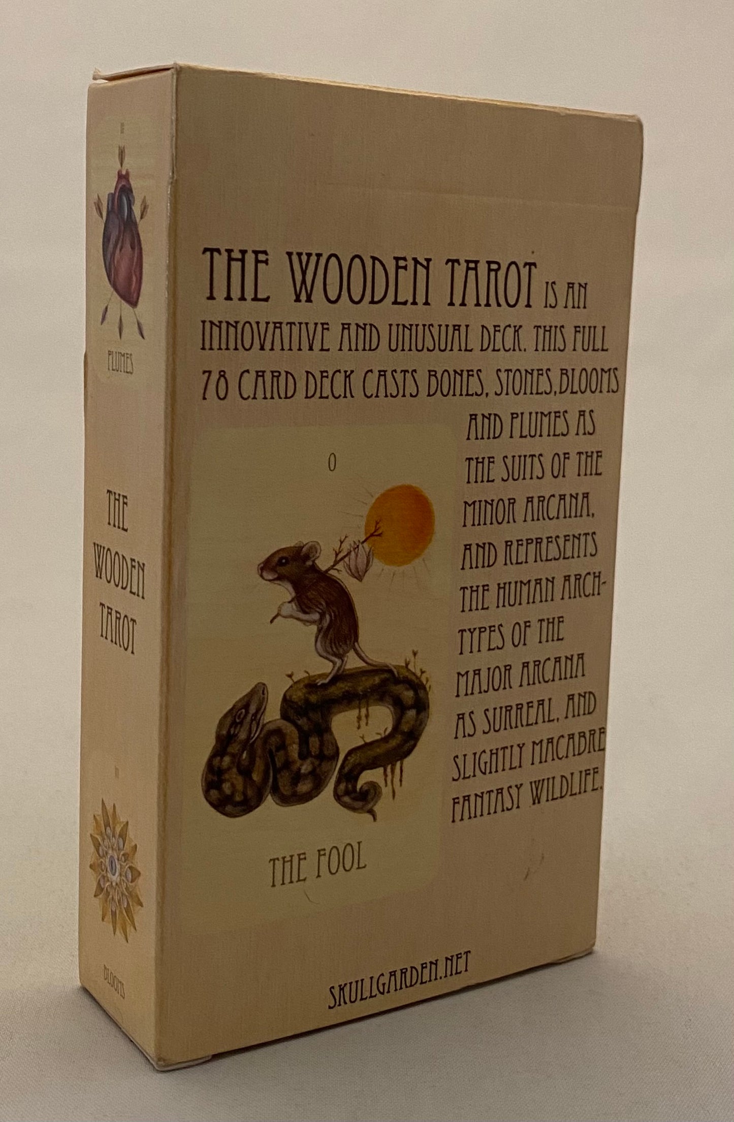 Box for 'The Wooden Tarot' with illustrations and text on a beige background
