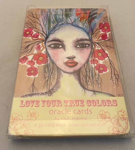 Love Your True Colors Oracle; portrait of a woman with red flowers in hair.