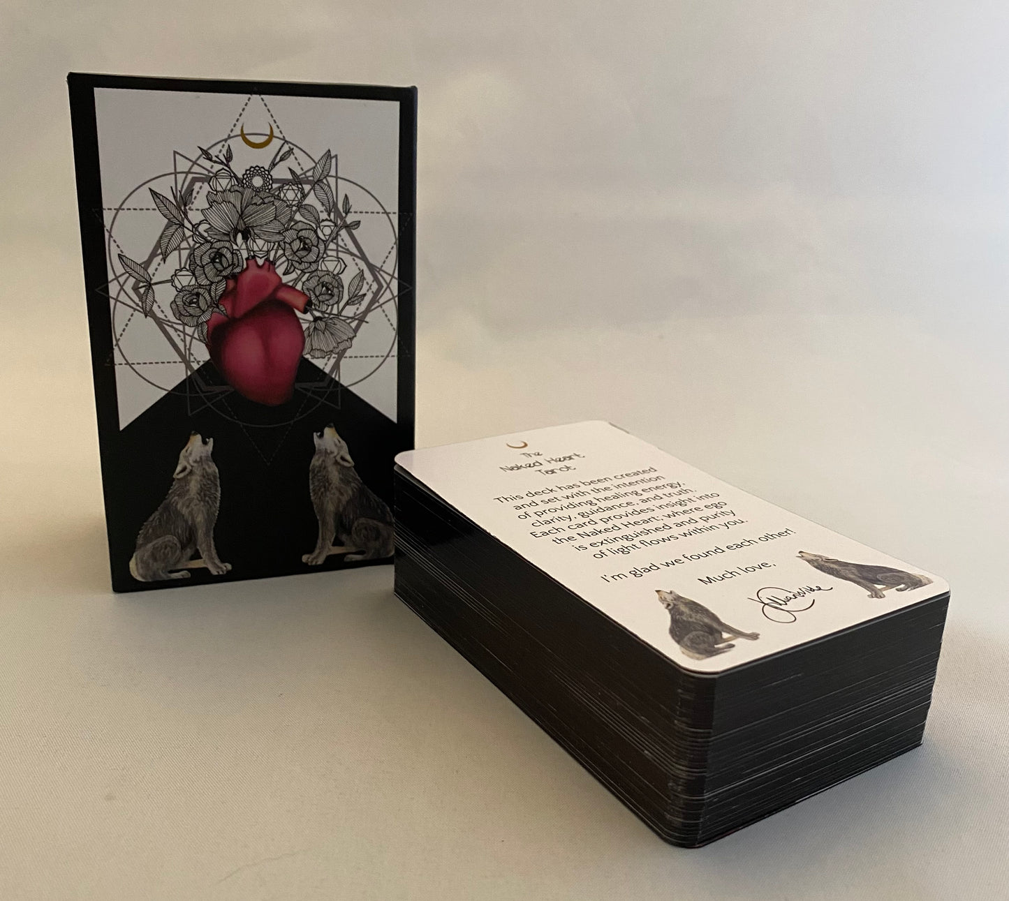 Set of tarot cards with a black border and white text on a light gray background