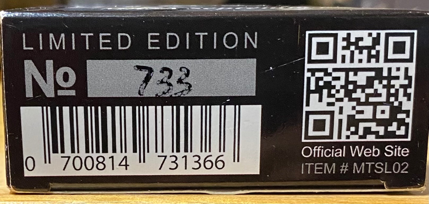 Limited edition product packaging with barcode, number, and QR code.