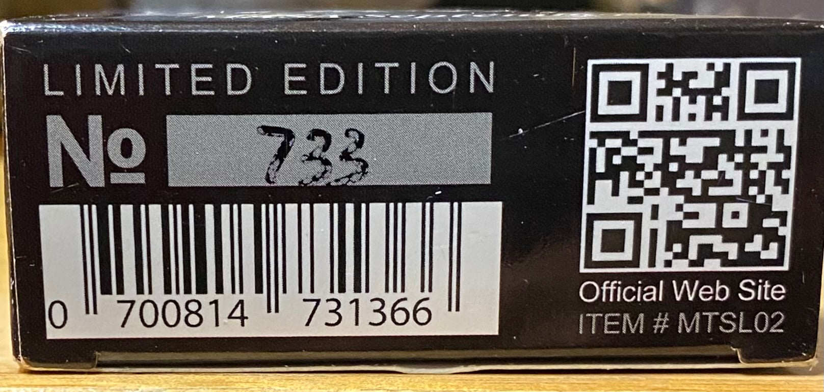 Limited edition product packaging with barcode, number, and QR code.