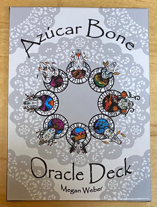 Oracle Deck packaging with stylized animal heads and intricate patterns on a light gray background.