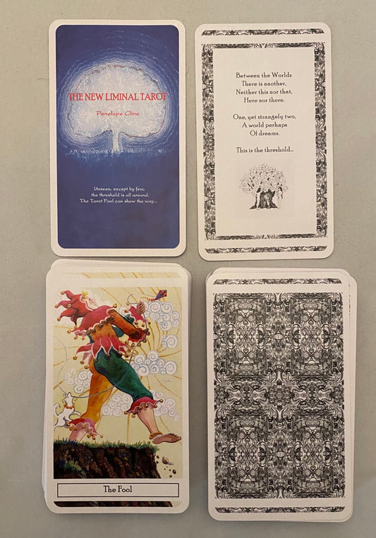 Four tarot cards displayed on a gray surface