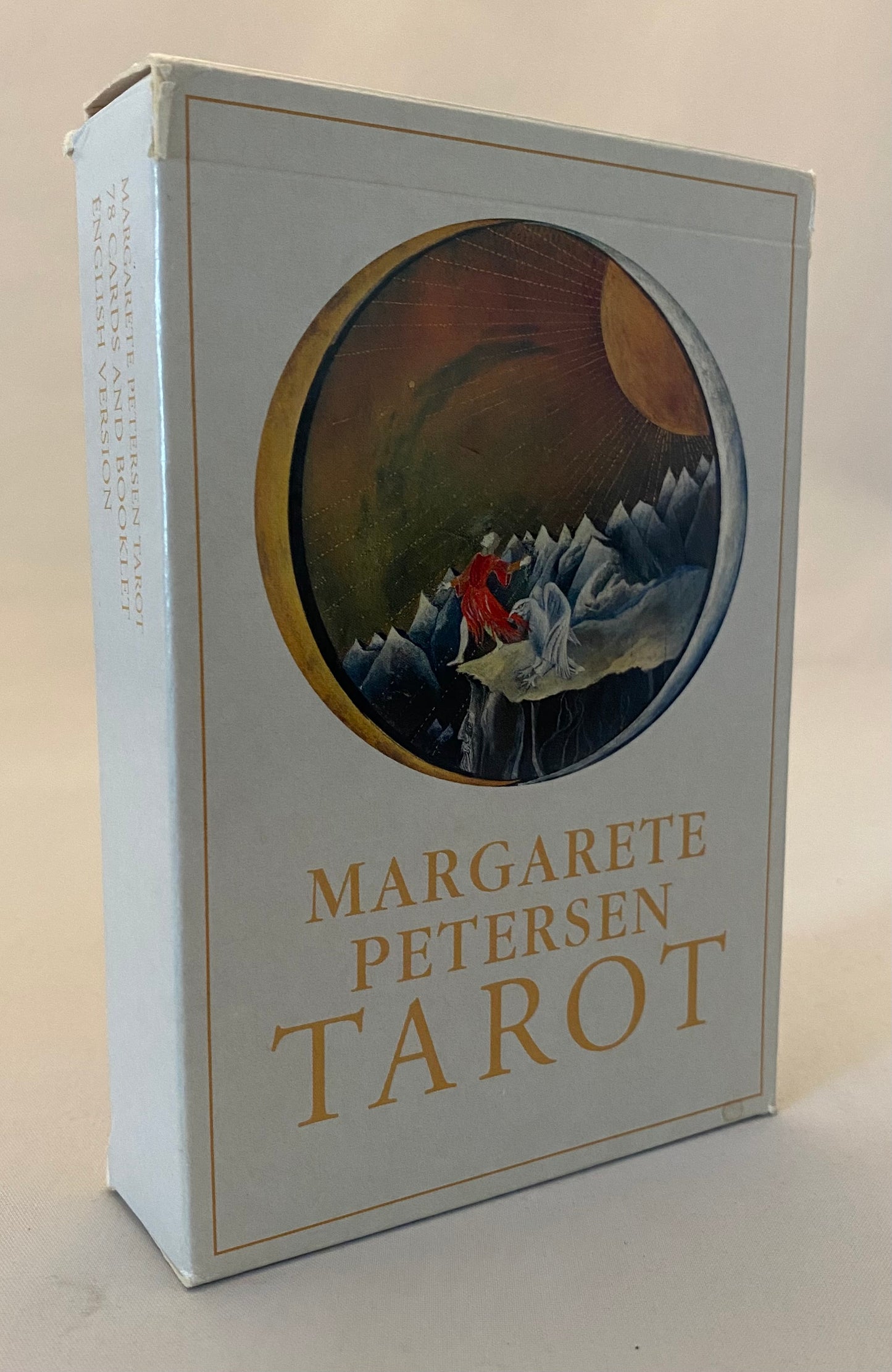 Tarot card box with 'Margarete Petersen Tarot' text and mountain scene on a beige background