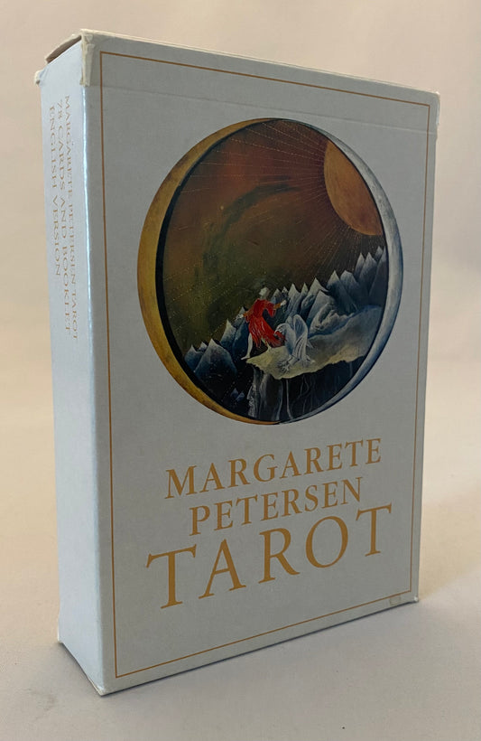 Tarot card box with 'Margarete Petersen Tarot' text and mountain scene on a beige background