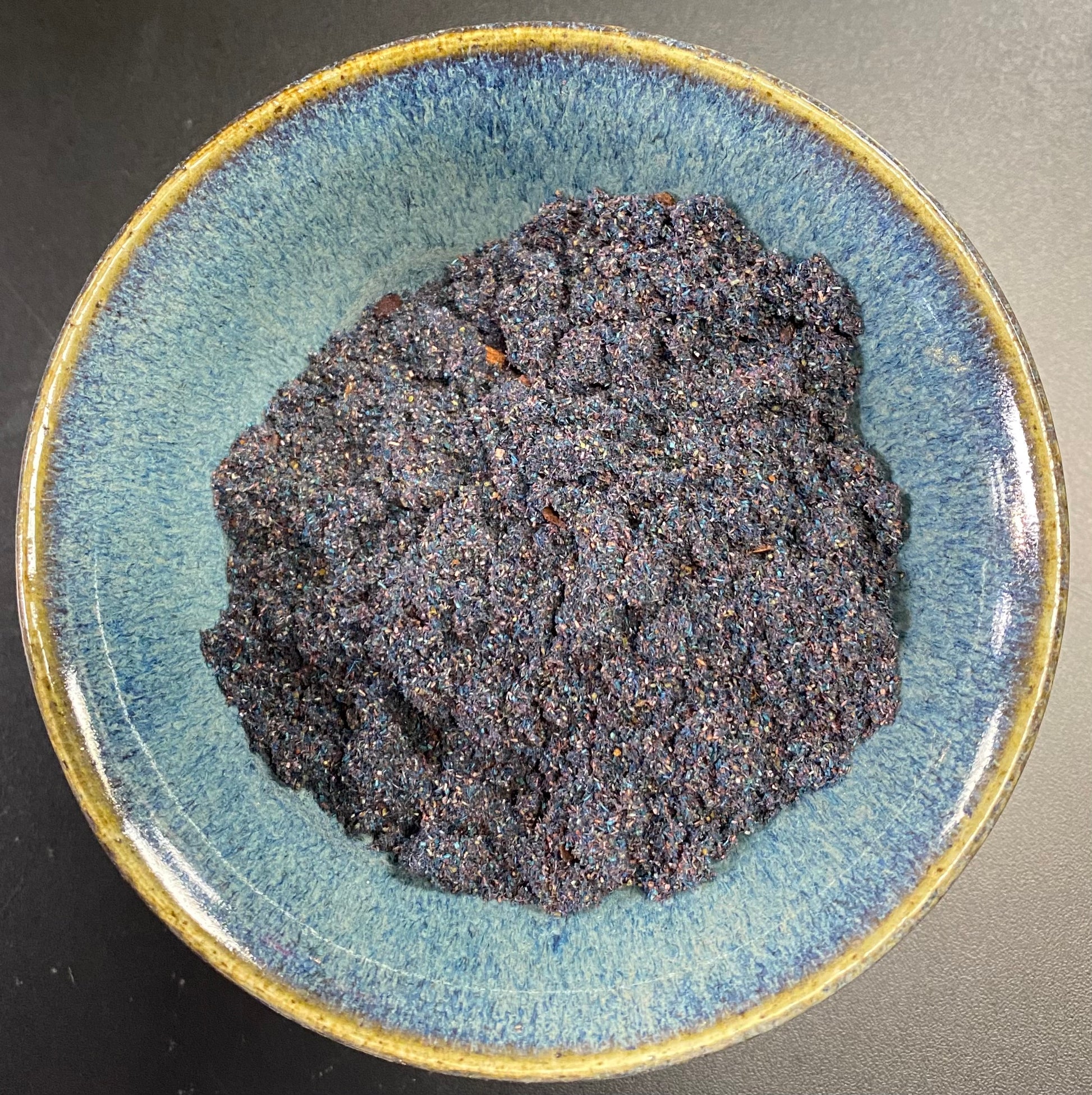 Abramelin Incense in a bowl powder purple