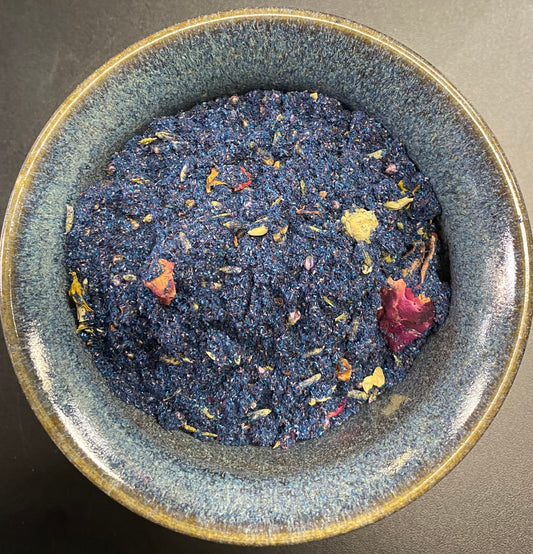 New Moon Incense HB purple powder with floral bits in