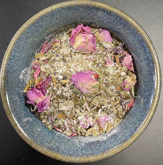 Lover's Tea roses with white powder with green herbals