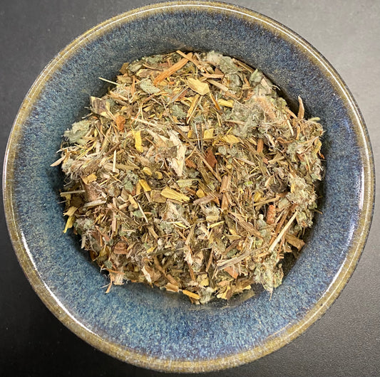 Sore Throat Tea yellows, browns, and greenish bits herbal mixture.