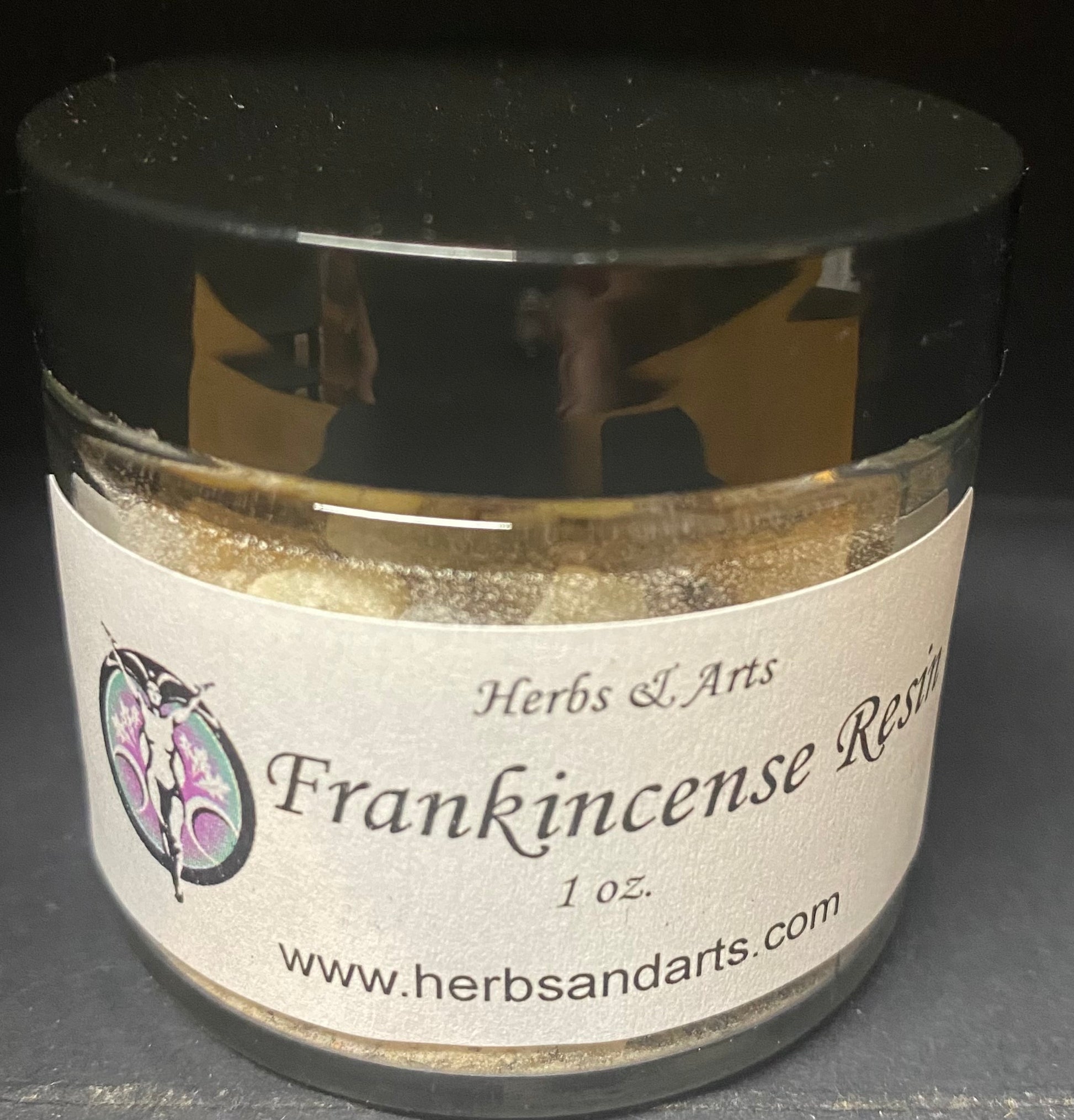 Jar of Frankincense Resin with 'Herbs & Arts' label on a dark background