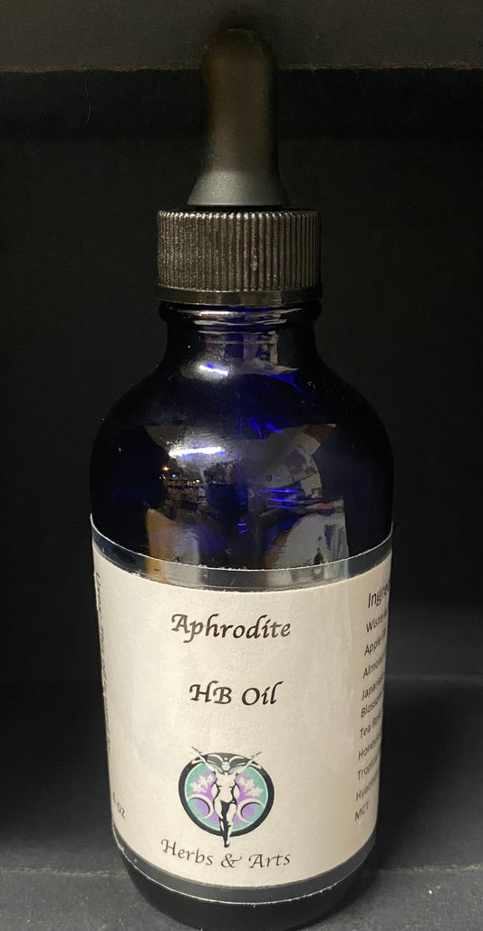 Blue glass bottle with dropper labeled 'Aphrodite HB Oil' on a dark background