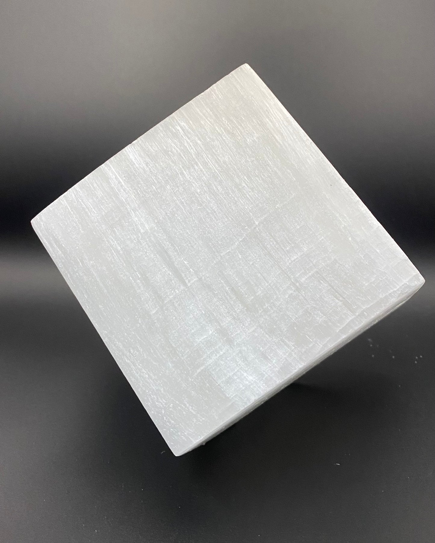 White square block on a gray background