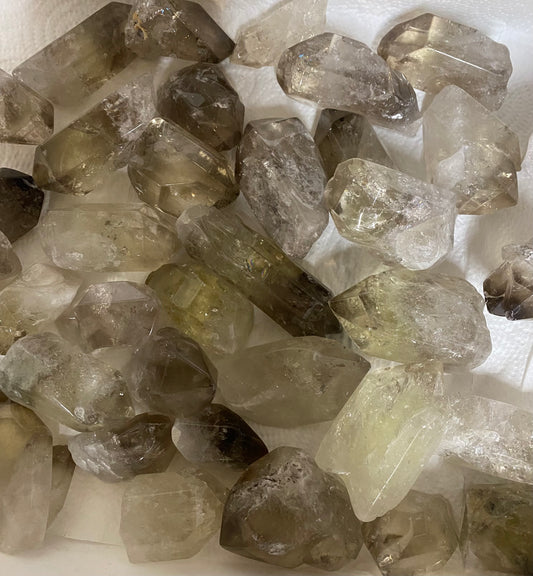 Close-up of raw crystal stones on a white background