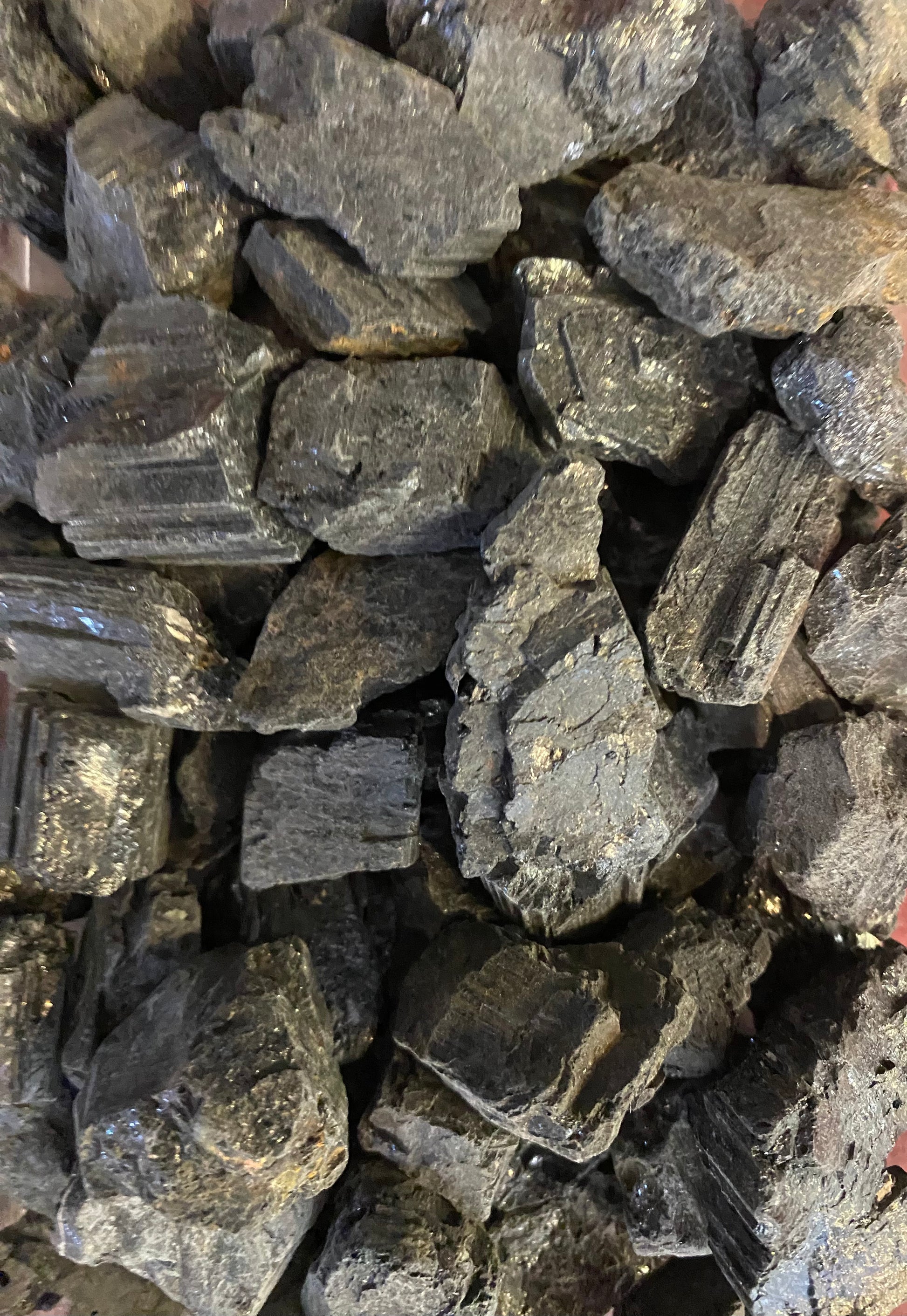 Close-up of dark gray stones or rocks