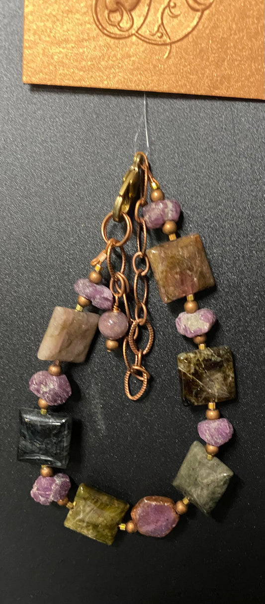 Jewelry with multicolored beads on a dark background