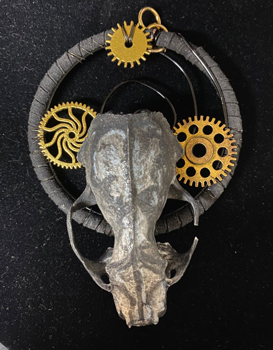 Skull with gold gears on a black background