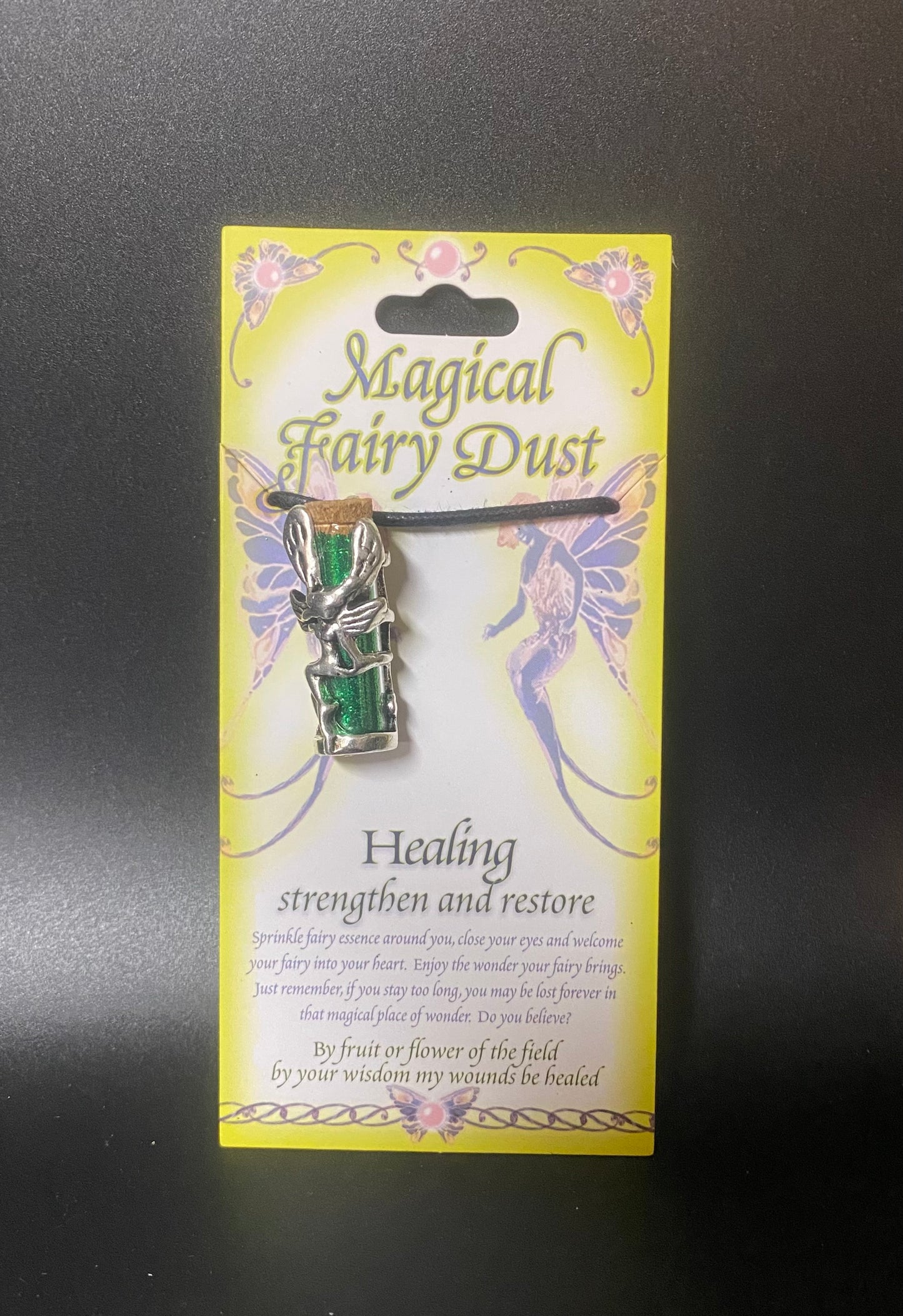 Magical Fairy Dust packaging with a fairy figure on a black background