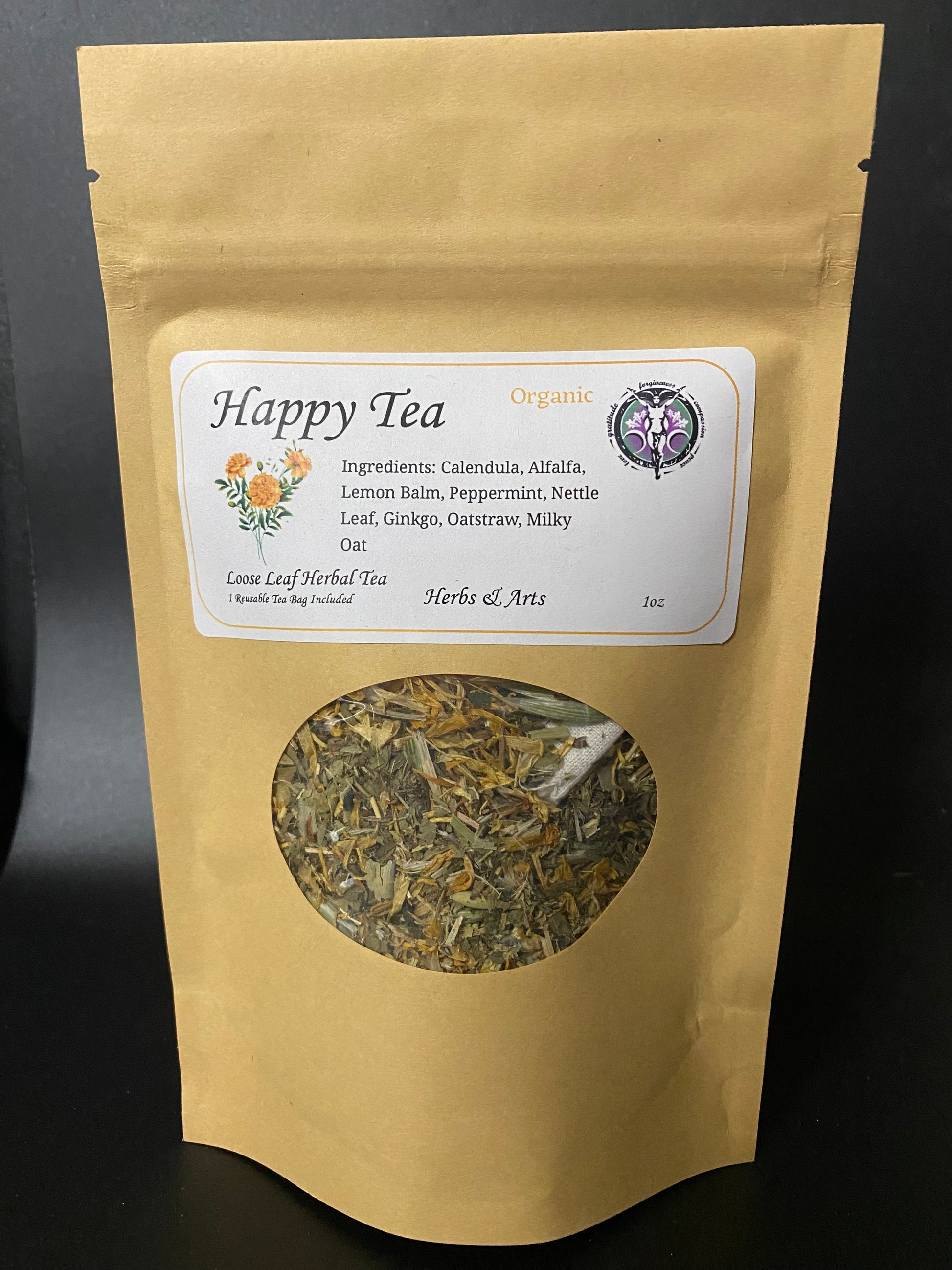 A stand-up kraft paper tea bag pouch labeled 'Happy Tea Organic' with a circular window showing loose herbal tea inside, photographed against a dark background.