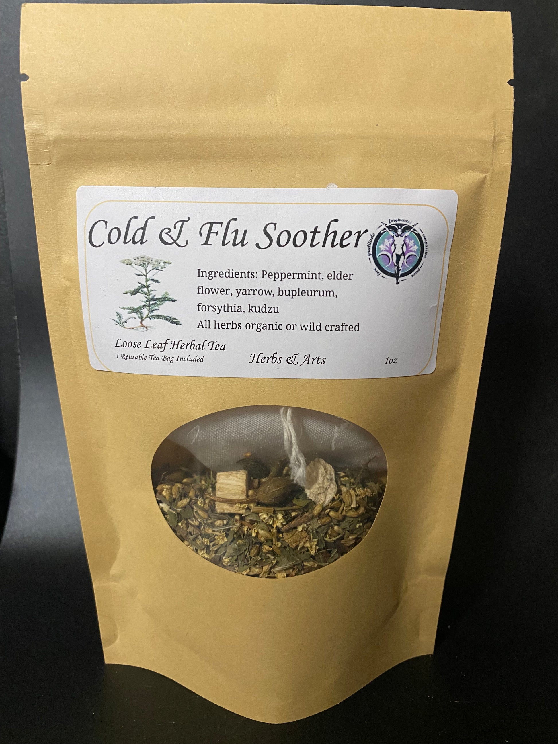 Cold & Flu Soother Tea Organic Kraft tea bag on a black background.