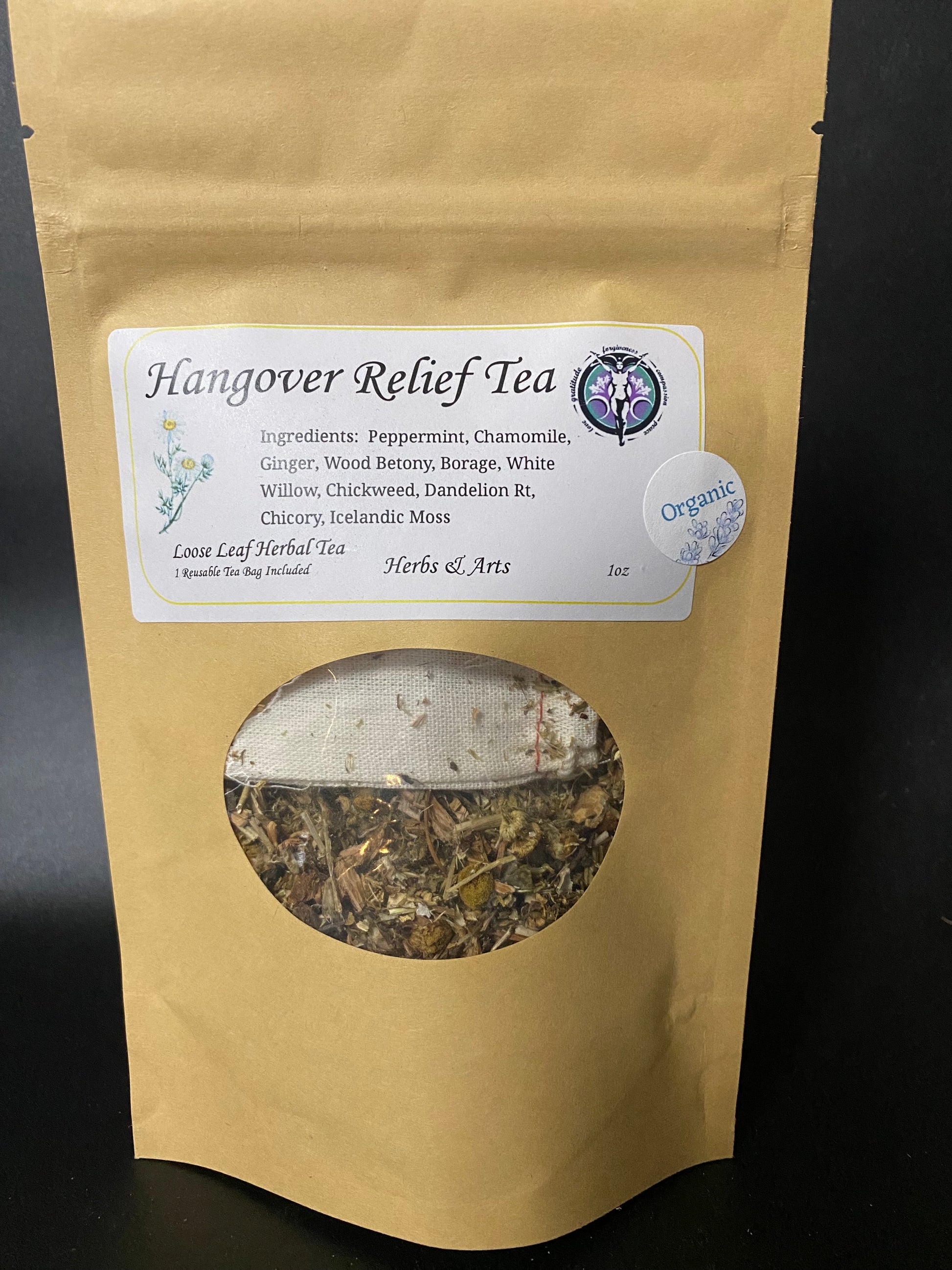 A kraft paper stand-up pouch of 'Hangover Relief Tea' by Herbs & Arts, featuring a white label with product details and a circular window showing the dried herbal tea blend inside.