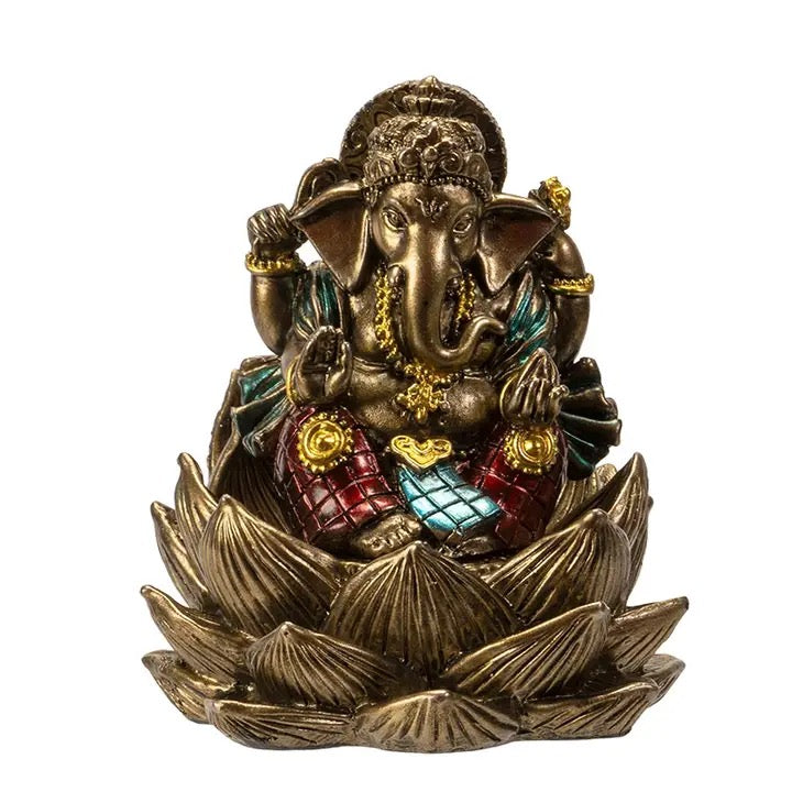 Bronze statue of a deity on a lotus flower with colorful elements on a white background