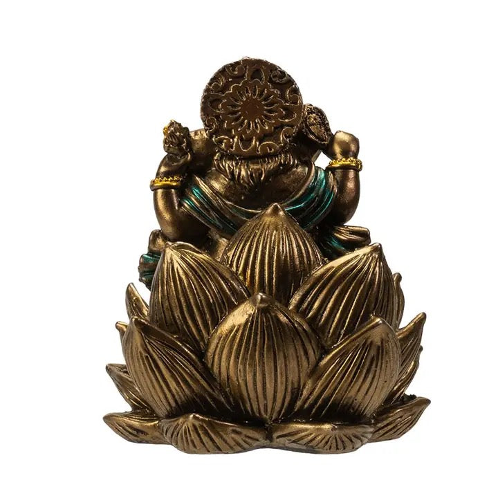 Bronze statue of a deity on a lotus flower against a white background