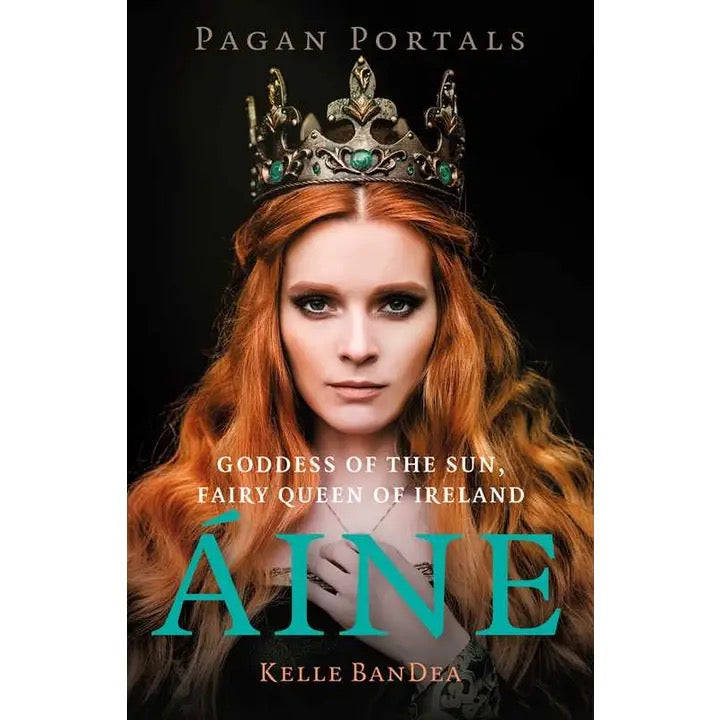 Book cover of 'Aine' by Kelle BanDea featuring a woman with red hair and a crown.