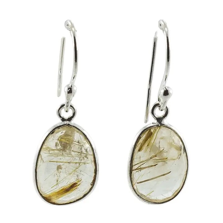 Pair of silver earrings with rutilated quartz stones on a white background