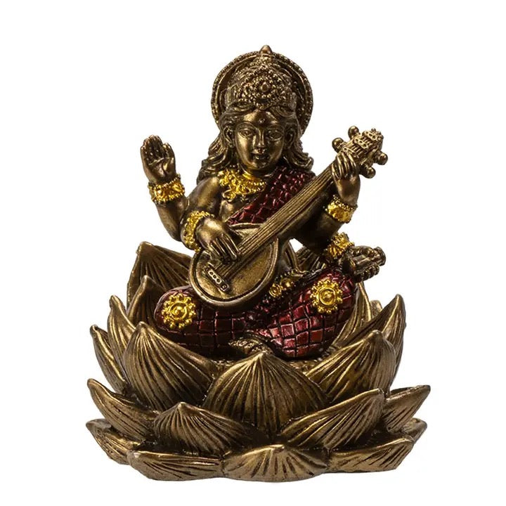 Bronze statue of a seated figure playing a stringed instrument on a white background