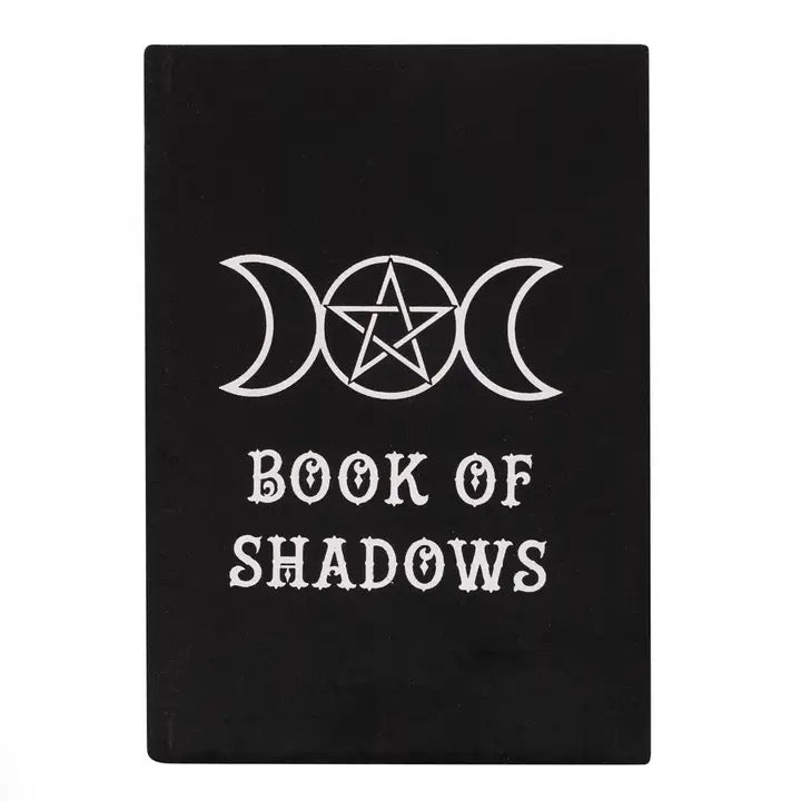 Black book with white 'Book of Shadows' text and moon and star symbols on a white background