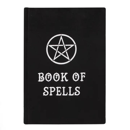 Black book titled 'Book of Spells' with a white pentagram symbol on a white background