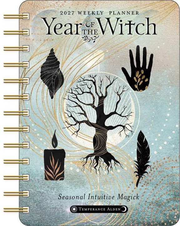 2027 weekly planner titled 'Year of the Witch' with tree, candle, and hand design on cover.