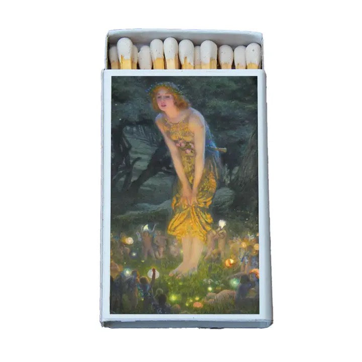 Matchbox with a fairy design on a white background