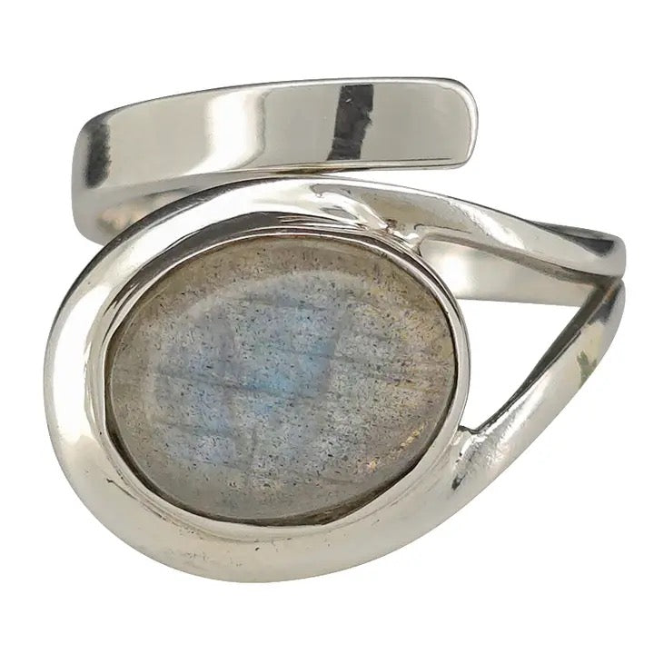 Silver ring with a round stone on a white background