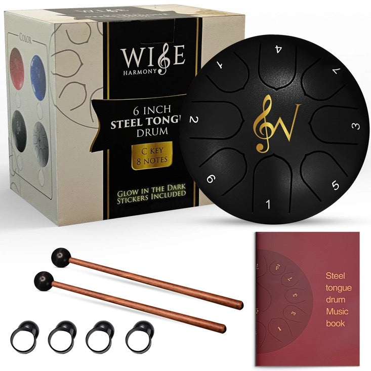 Wise Harmony steel tongue drum set with packaging, drum, mallets, and music book on a white background