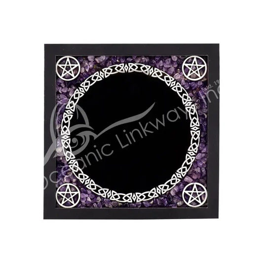 Decorative frame with pentacle design on a black background