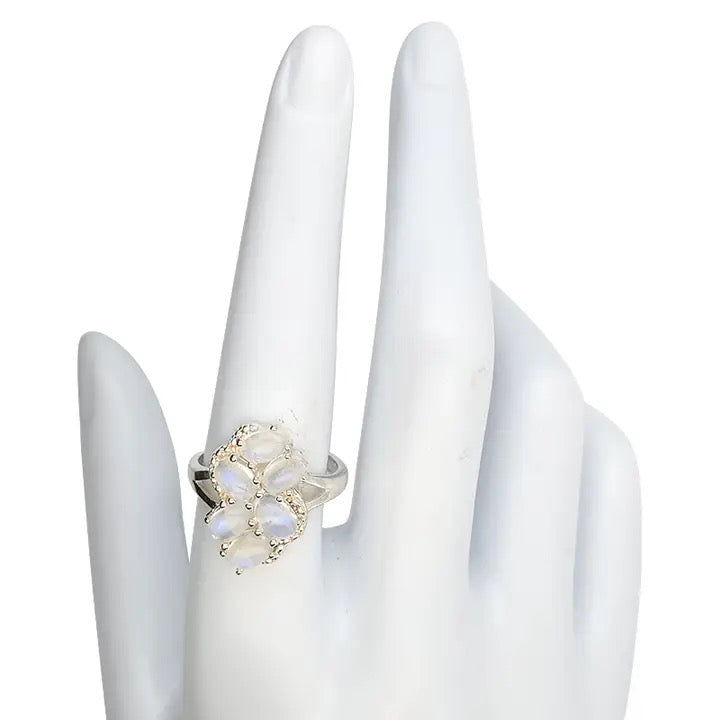 Ring Moonstone Cluster silver on white hand and background