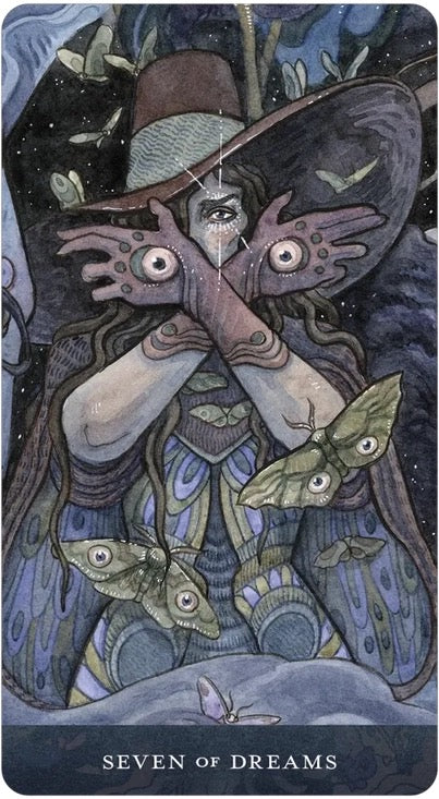 Card from a tarot deck titled 'Seven of Dreams' featuring a fairy with moth-like wings and a butterfly.